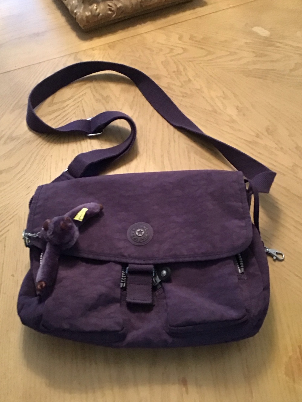 Kipling Plum Purple Crossbody Bag with Monkey Charm
